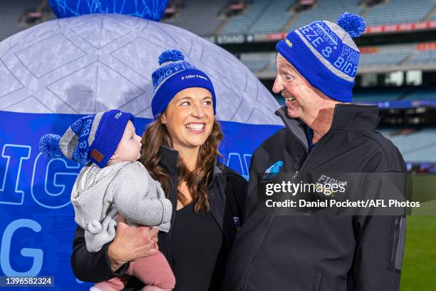 Neale Daniher poses for a photograph with daughter Bec Daniher and granddaughter Billie Daniher during the FightMND Launch Of The Big Freeze 8...