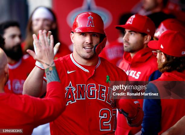 Mike Trout of the Los Angeles Angels celebrates a run against the Tampa Bay Rays in the first inning at Angel Stadium of Anaheim on May 10, 2022 in...