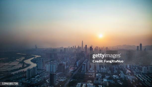 cityscape of office buildings in shenzhen's financial area futian district at sunset, china - shenzhen stock pictures, royalty-free photos & images