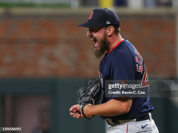 John Schreiber of the Boston Red Sox reacts after their 9-4 win against the Atlanta Braves at Truist Park on May 10, 2022 in Atlanta, Georgia.