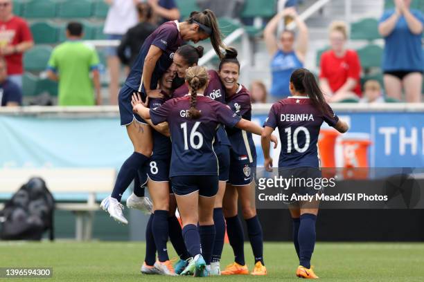 Nicoli Kerolin of the North Carolina Courage is mobbed by teammates after scoring a goal during the NWSL Challenge Cup Final between Washington...