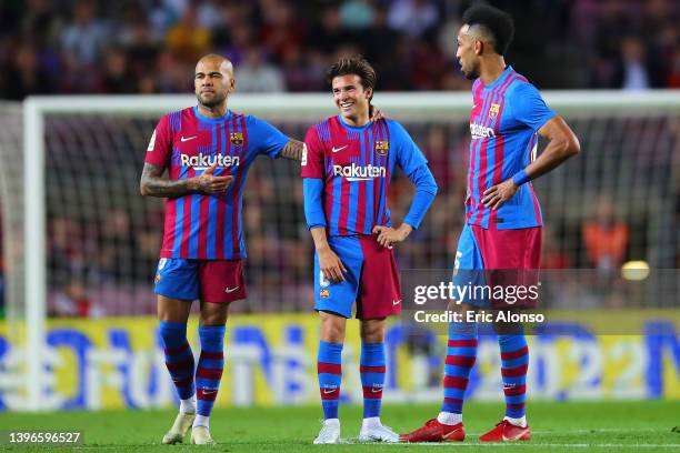 Riqui Puig and Dani Alves of FC Barcelona speaks during the La Liga Santander match between FC Barcelona and RC Celta de Vigo