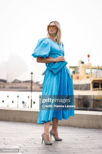 Nikki Phillips wearng blue Aje dress and Jacquemus blue bag at Afterpay Australian Fashion Week 2022 on May 11, 2022 in Sydney, Australia.
