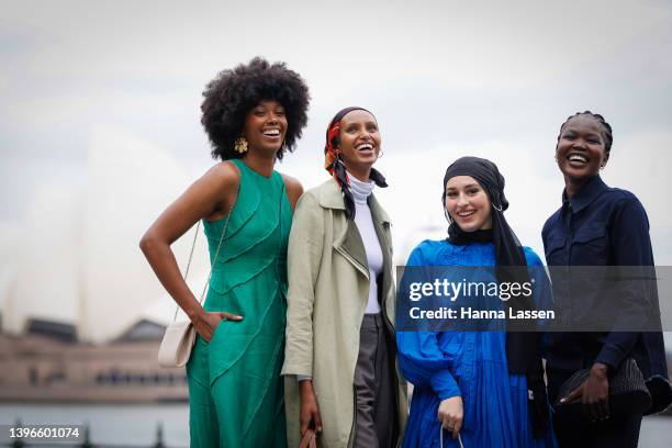 Aiyana Alexander wearing Aje Green long dress, Hanan Ibrahim wearing Bougessa, Nawal Sari wearing Aje and Poppylissnan bag and Malaan Ajang wearing...