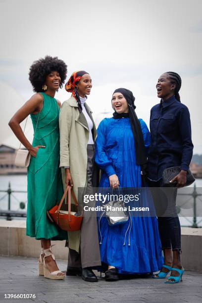 Aiyana Alexander wearing Aje Green long dress, Hanan Ibrahim wearing Bougessa, Nawal Sari wearing Aje and Poppylissnan bag and Malaan Ajang wearing...