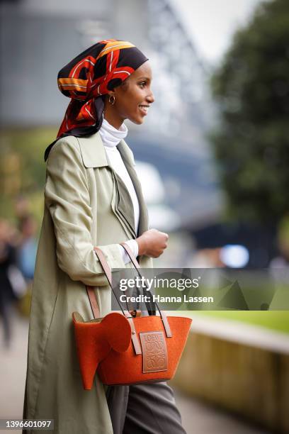 Aiyana Alexander wearing Aje Green long dress, Hanan Ibrahim wearing Bougessa, Nawal Sari wearing Aje and Poppylissnan bag and Malaan Ajang wearing...