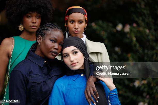 Aiyana Alexander wearing Aje Green long dress, Hanan Ibrahim wearing Bougessa, Nawal Sari wearing Aje and Poppylissnan bag and Malaan Ajang wearing...