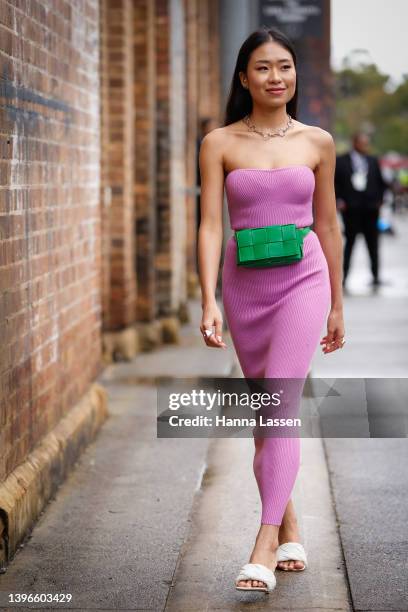 Wanda Janyakulmongkhol kookai purple dress green bag white billini heels at Afterpay Australian Fashion Week 2022 on May 11, 2022 in Sydney,...