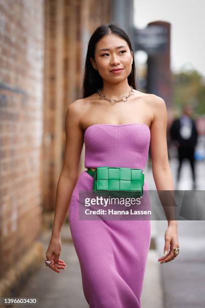 Wanda Janyakulmongkhol kookai purple dress green bag white billini heels at Afterpay Australian Fashion Week 2022 on May 11, 2022 in Sydney,...