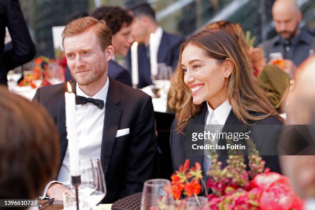 Andre Schuerle and his wife Anna Schuerle attend the Montblanc House opening on May 10, 2022 in Hamburg, Germany.