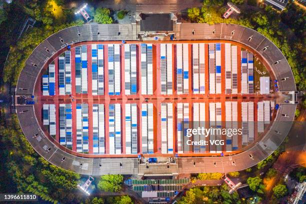 Aerial view of a makeshift hospital converted from Jiangwan Stadium on May 9, 2022 in Shanghai, China. Construction of the makeshift hospital for...
