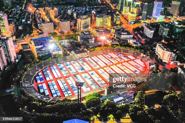 Aerial view of a makeshift hospital converted from Jiangwan Stadium on May 9, 2022 in Shanghai, China. Construction of the makeshift hospital for...