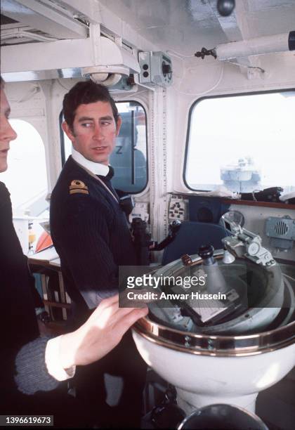 Prince Charles, Prince of Wales as Captain of Royal Navy ship, HMS Bronington giving orders during a mine counter measure exercise in October 1976 in...