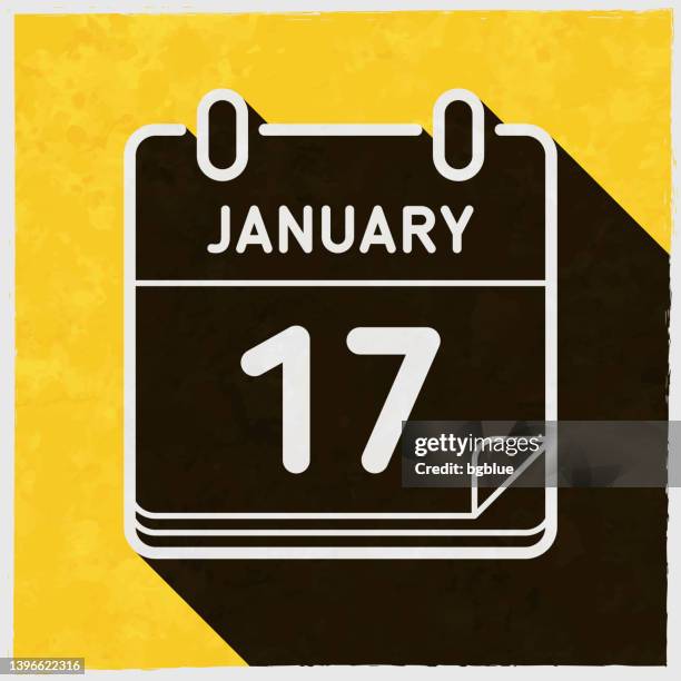 january 17. icon with long shadow on textured yellow background - jan 17 stock illustrations