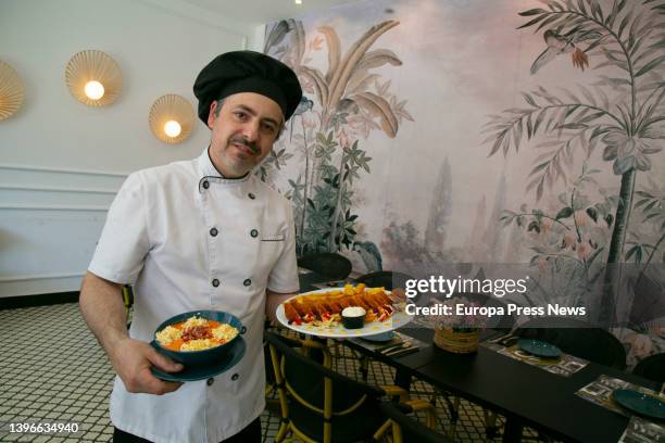 Cook with a flamenquin de salmorejo cordobes at Taberna La Oveja Negra of Grupo La Carboneria, on 10 May, 2022 in Cordoba, Andalusia, Spain....