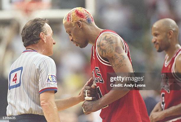 Forward Dennis Rodman of the Chicago Bulls argues with an official during a playoff game against the Miami Heat at the Miami Arean in Miami, Florida....