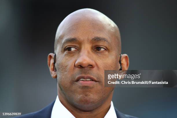 Dion Dublin looks on during the Premier League match between Aston Villa and Liverpool at Villa Park on May 10, 2022 in Birmingham, England.