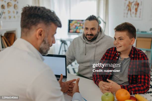 i will explain - chubby boy stock pictures, royalty-free photos & images