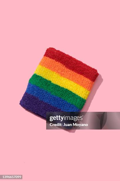 wristband patterned with the rainbow flag - sweat band stock pictures, royalty-free photos & images