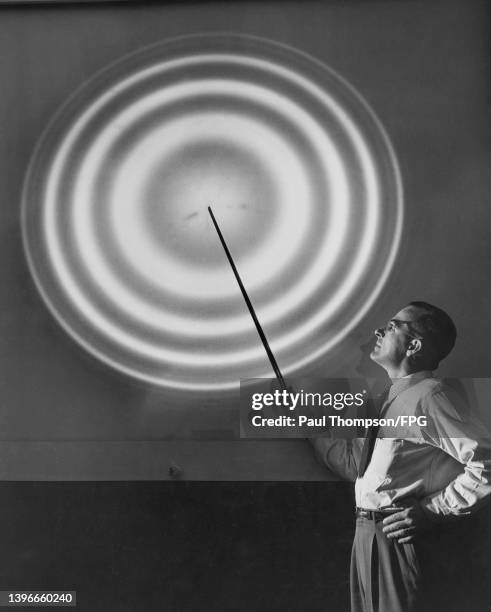 American scientist Kenneth B Adams with the target-like circles of light that may form the basis of a new international standard, by measuring the...