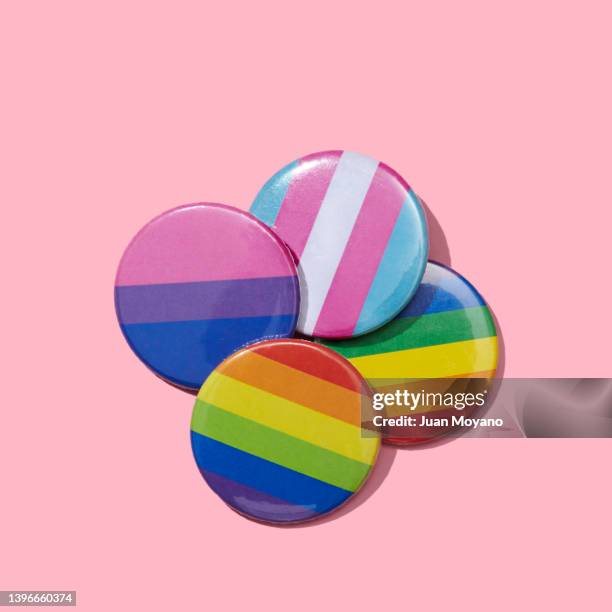 pin buttons patterned with different lgbtiq flags - social awareness symbol stock-fotos und bilder