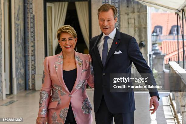 Henri, Grand Duke of Luxembourg, and Maria Teresa, Grand Duchess of Luxembourg, pose for pictures at the veranda after their meeting with Portuguese...