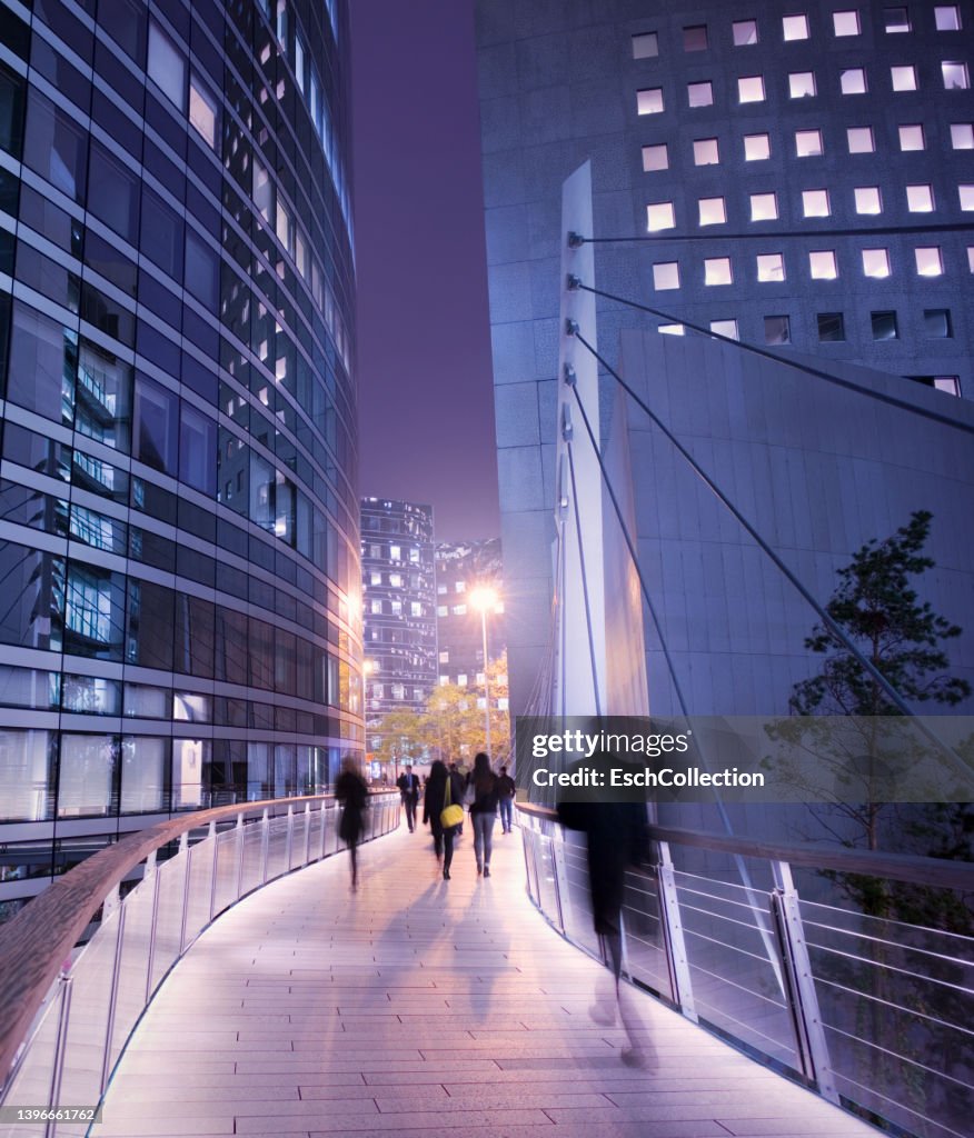 Business people using walkway at business district in Paris