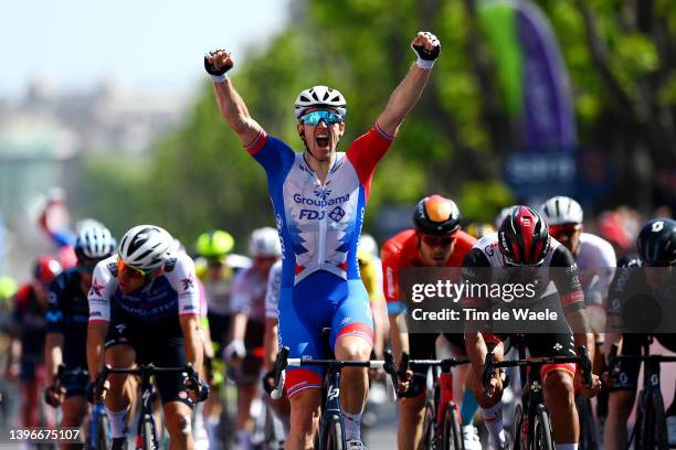 Arnaud Demare of France and Team Groupama - FDJ celebrates winning ahead of Fernando Gaviria Rendon of Colombia and UAE Team Emirates during the...