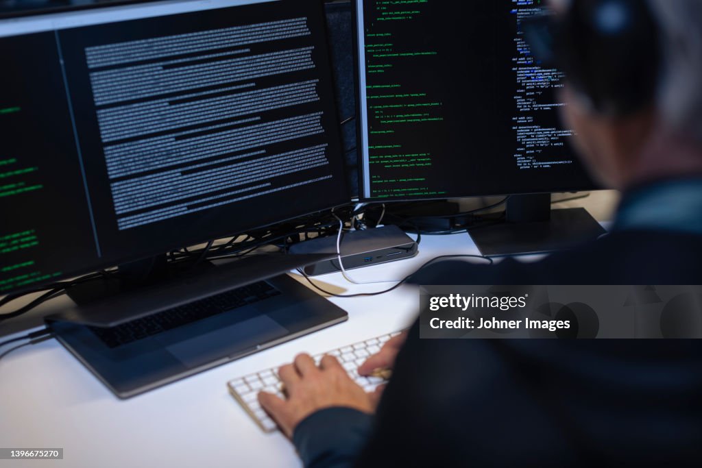 Male Programmer Working On Computer High-Res Stock Photo - Getty Images