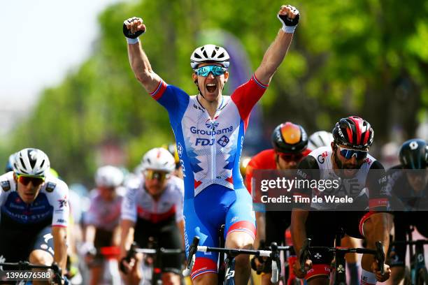 Arnaud Demare of France and Team Groupama - FDJ celebrates winning ahead of Fernando Gaviria Rendon of Colombia and UAE Team Emirates during the...