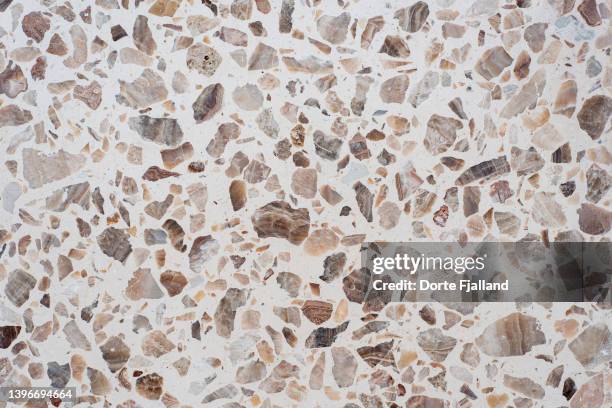 closeup of brown and beige terrazzo tile - terrazzo stock pictures, royalty-free photos & images