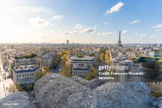 eiffel tower and the buildings of paris, high point of view. champs elysees, france, europe - arc de triomphe overview stock pictures, royalty-free photos & images