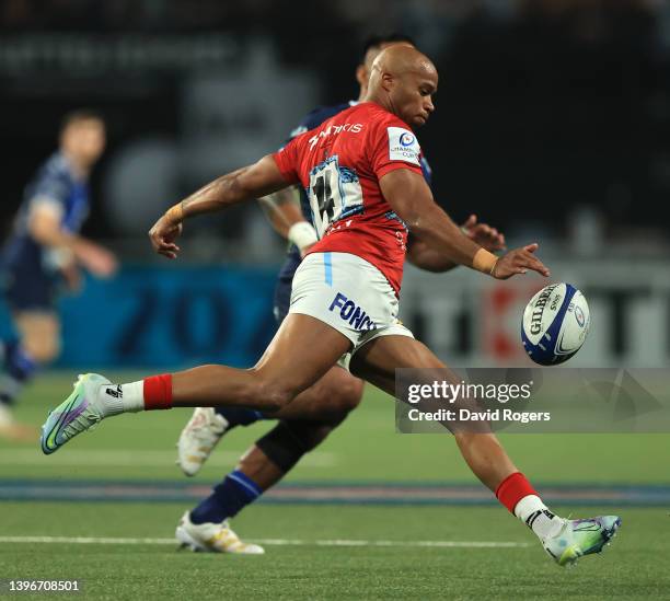 Teddy Thomas of Racing 92 kicks the ball upfield during the Heineken Champions Cup Quarter Final match between Racing 92 and Sale Sharks at Paris La...