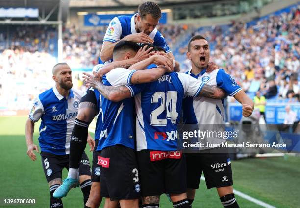 Miguel de la Fuente of Deportivo Alaves celebrates after scoring their side's first goal with team mates during the La Liga Santander match between...