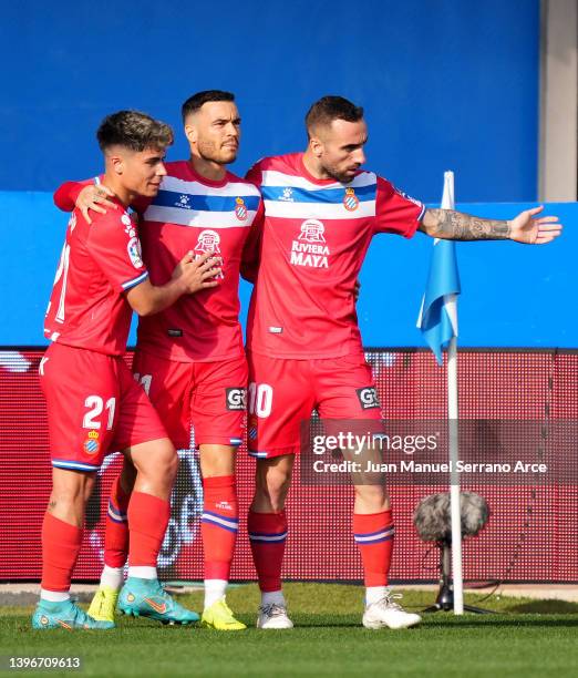 Raul de Tomas of Espanyol celebrates after scoring their side's first goal with Nico Melamed and Sergi Darder during the La Liga Santander match...