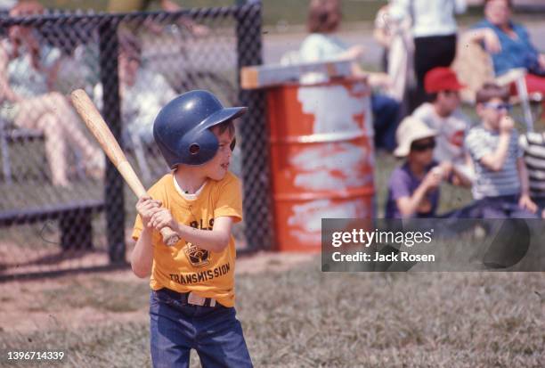 View of a young baseball player at bat as he waits for a pitch during a Levittown Continental Little League game, Levittown, Pennsylvania, June 1970.