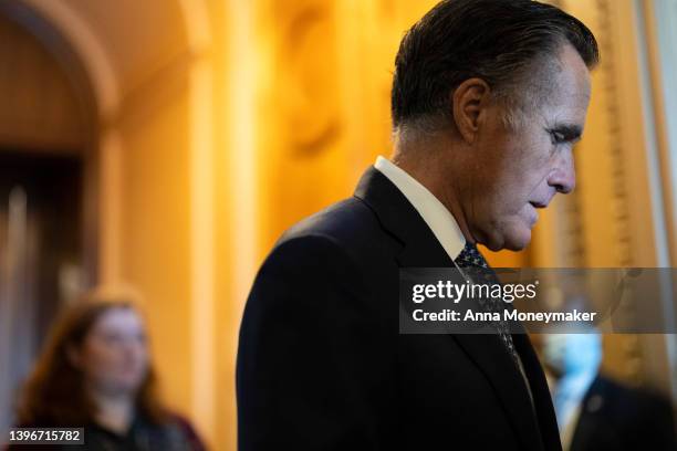 Sen. Mitt Romney speaks to reporters outside of the Senate Chambers during a series of votes in the U.S. Capitol Building on May 11, 2022 in...