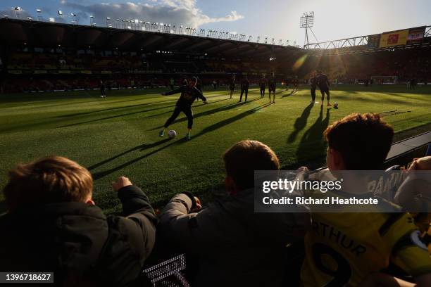 General view inside the stadium as both teams warm up prior to the Premier League match between Watford and Everton at Vicarage Road on May 11, 2022...