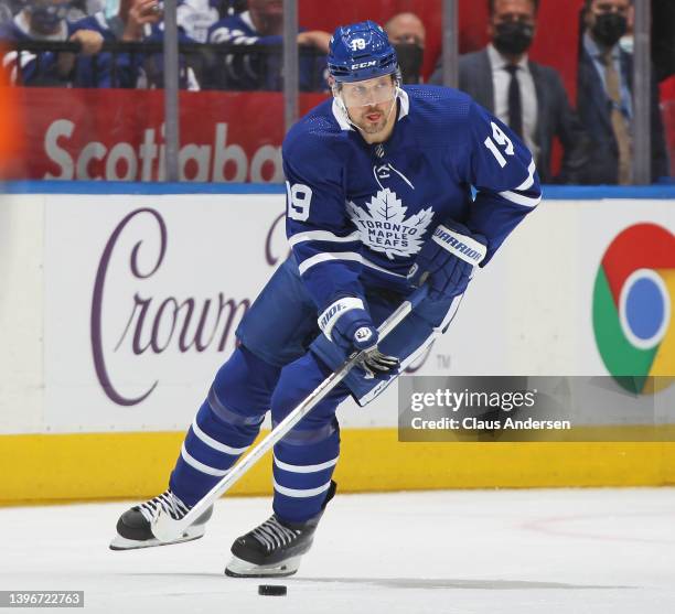 Jason Spezza of the Toronto Maple Leafs skates with the puck against the Tampa Bay Lightning during Game Five of the First Round of the 2022 Stanley...