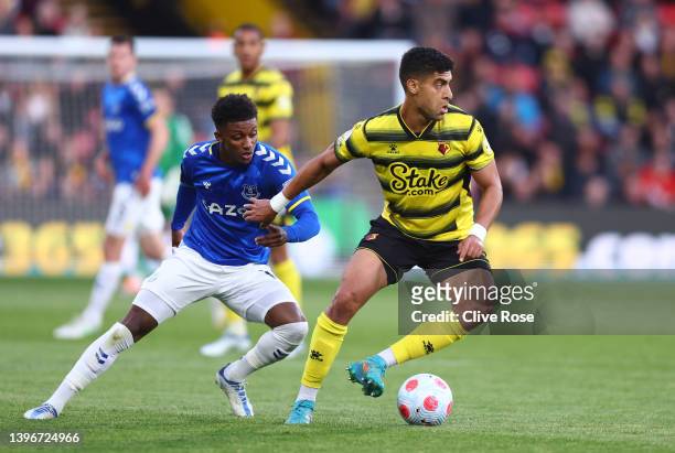 Adam Masina of Watford FC on the ball whilst under pressure from Demarai Gray of Everton during the Premier League match between Watford and Everton...