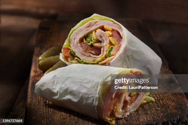 ham and turkey lettuce wrap sandwich - cold cuts stock pictures, royalty-free photos & images