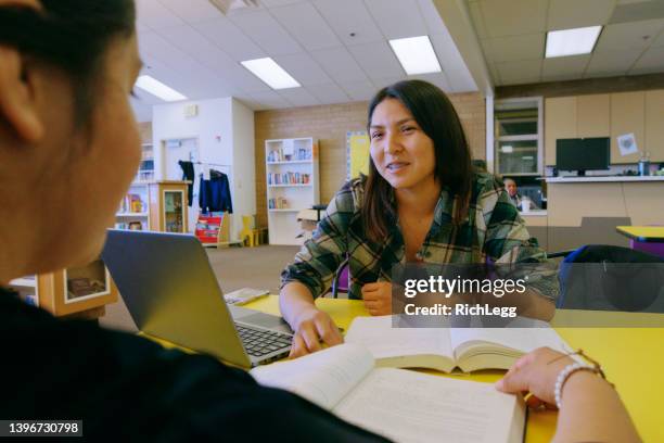 high school student in a library - indian college girl stock pictures, royalty-free photos & images