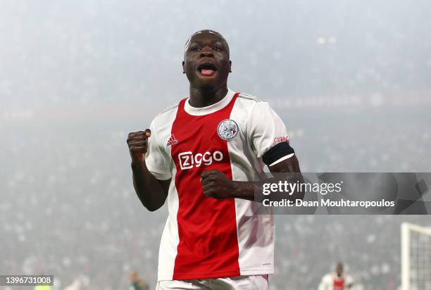 Brian Brobbey of Ajax celebrates after scoring their side's fourth goal during the Dutch Eredivisie match between Ajax and sc Heerenveen at Johan...