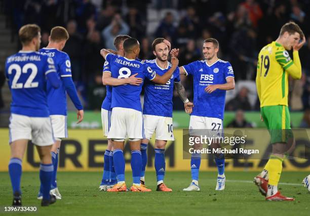 James Maddison of Leicester City celebrates with Timothy Castagne and teammates after scoring their side's third goal during the Premier League match...