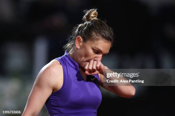 Simona Halep of Romania reacts in her women's singles second round match against Danielle Collins of The United States during day four of the...