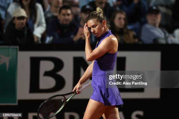 Simona Halep of Romania reacts in her women's singles second round match against Danielle Collins of The United States during day four of the...