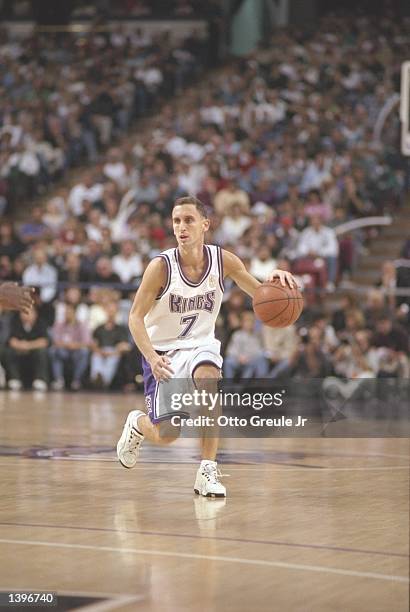 Guard Bobby Hurley of the Sacramento Kings dribbles the ball down the court during a game against the Portland Trailblazers at the Arco Arena in...