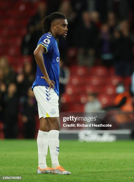 Alex Iwobi of Everton looks dejected following the Premier League match between Watford and Everton at Vicarage Road on May 11, 2022 in Watford,...