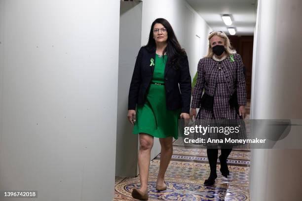 Rep. Rashida Tlaib and Rep. Debbie Dingell depart from Senate side of the U.S. Capitol after joining House Progressive members in protesting for...