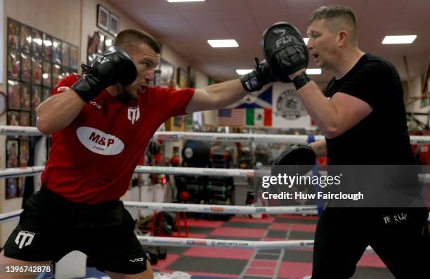 Welsh boxer Liam Williams with his trainer Brett Parry during a training at his local boxing Gym on May 11, 2022 in Maerdy, Wales.